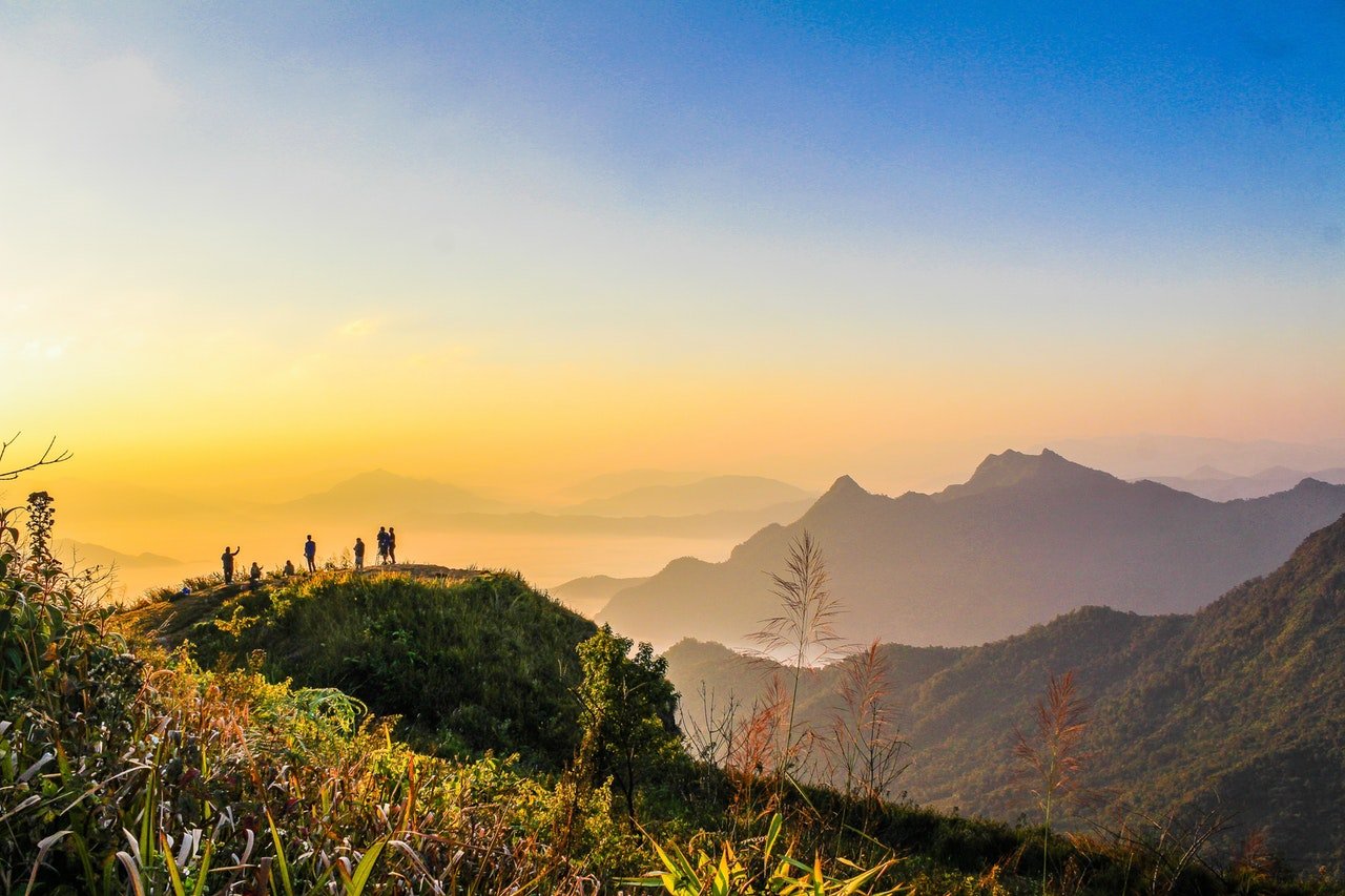 Certificación Photo Of People Standing On Top Of Mountain Near Grasses 733162